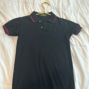 A Fred Perry black with red accent polo shirt